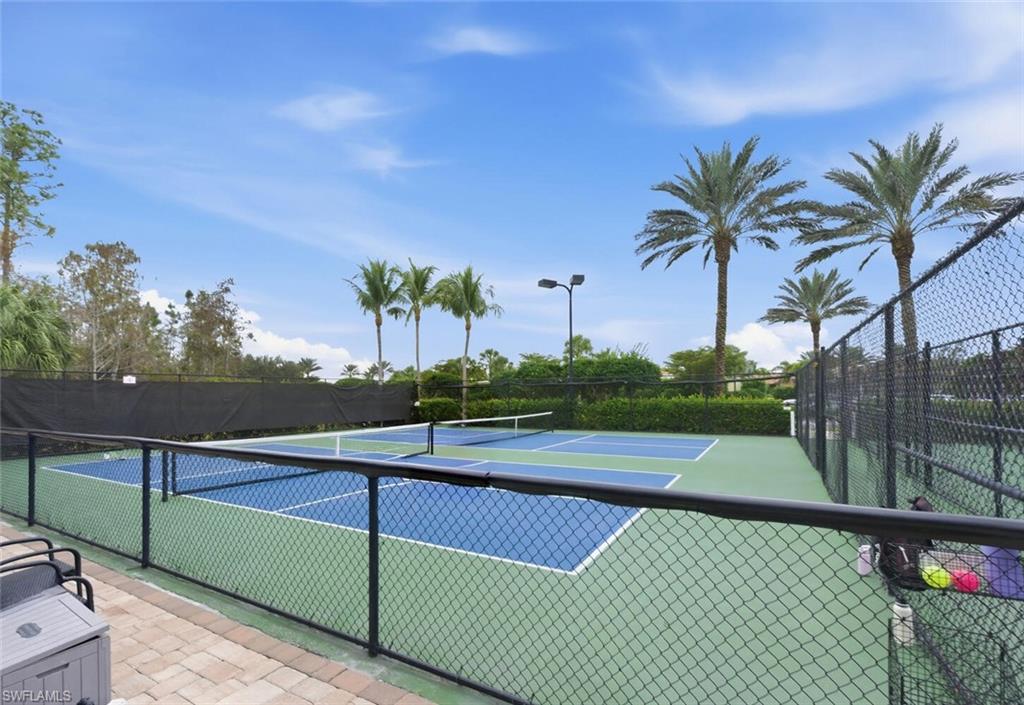 9365 Pocida Court, Unit 202 Naples, FL 34119 - Photo 40 of 40 a view of a tennis court