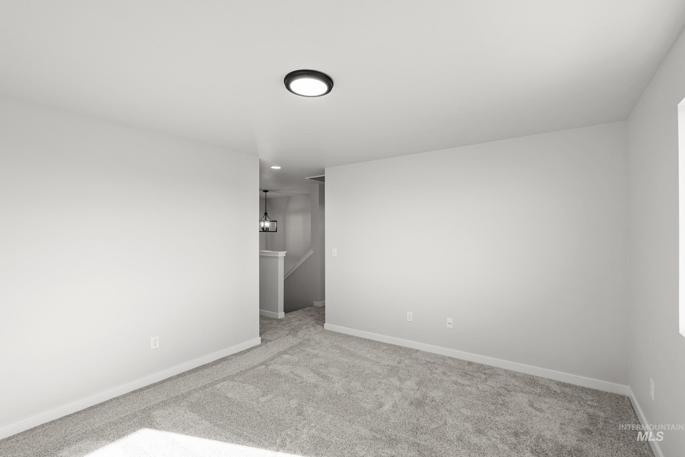 1687 Dyer Street Middleton, ID 83644 - Photo 17 of 28 Unfurnished room featuring carpet floors and baseboards