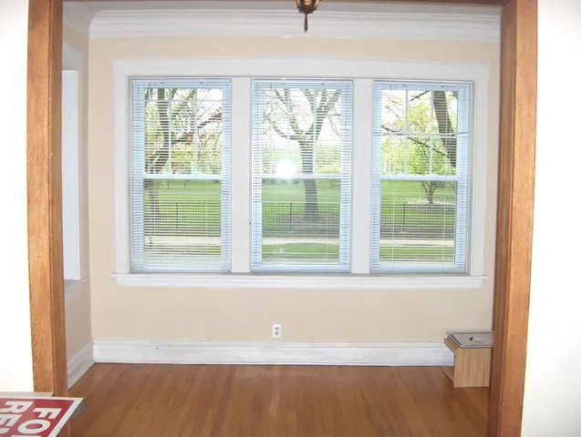 a bathroom with a bathtub and window