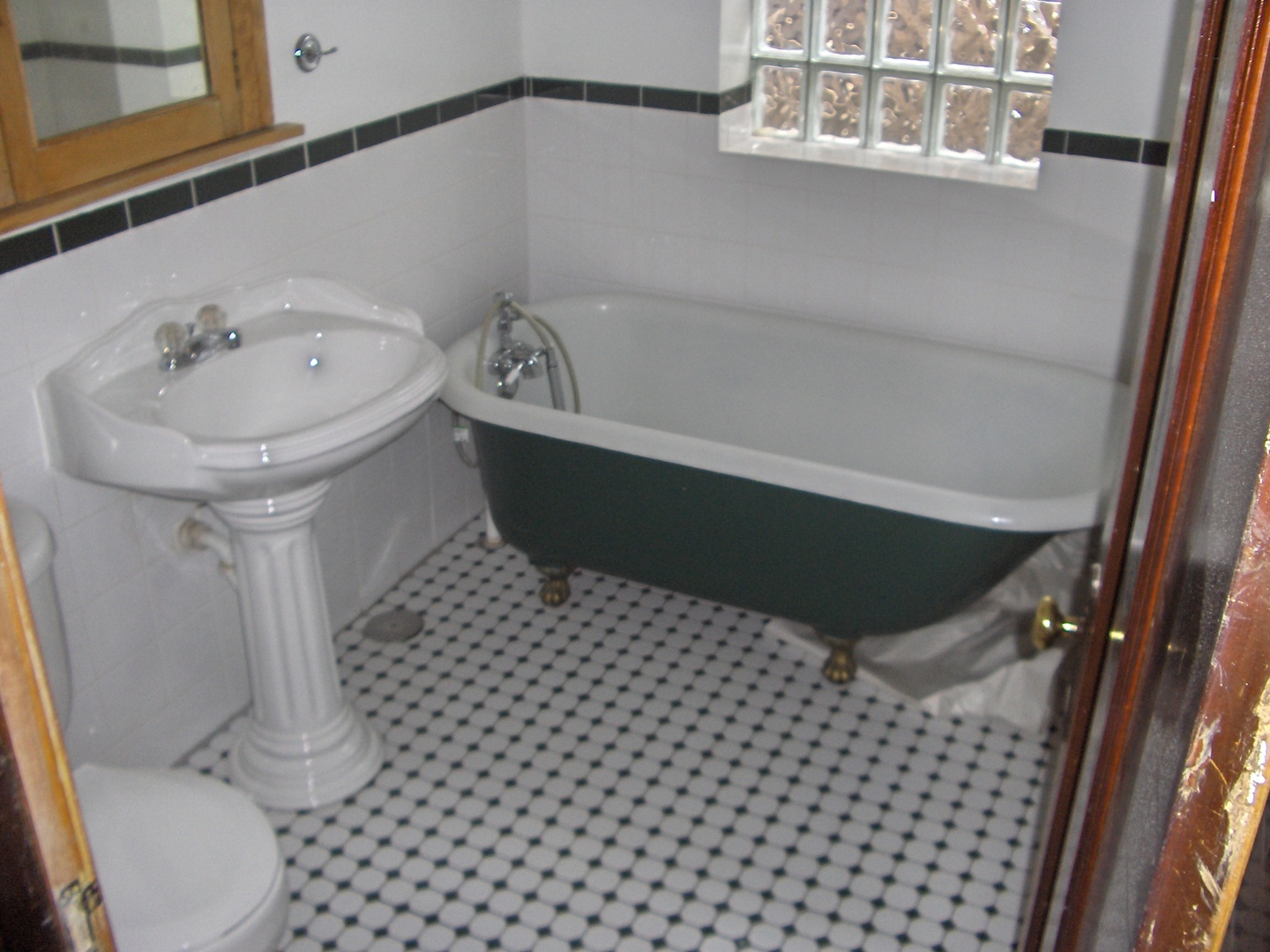 4039 North Long Avenue, Unit 1 Chicago, IL 60641 - Photo 4 of 20 a bathroom with a sink toilet and shower