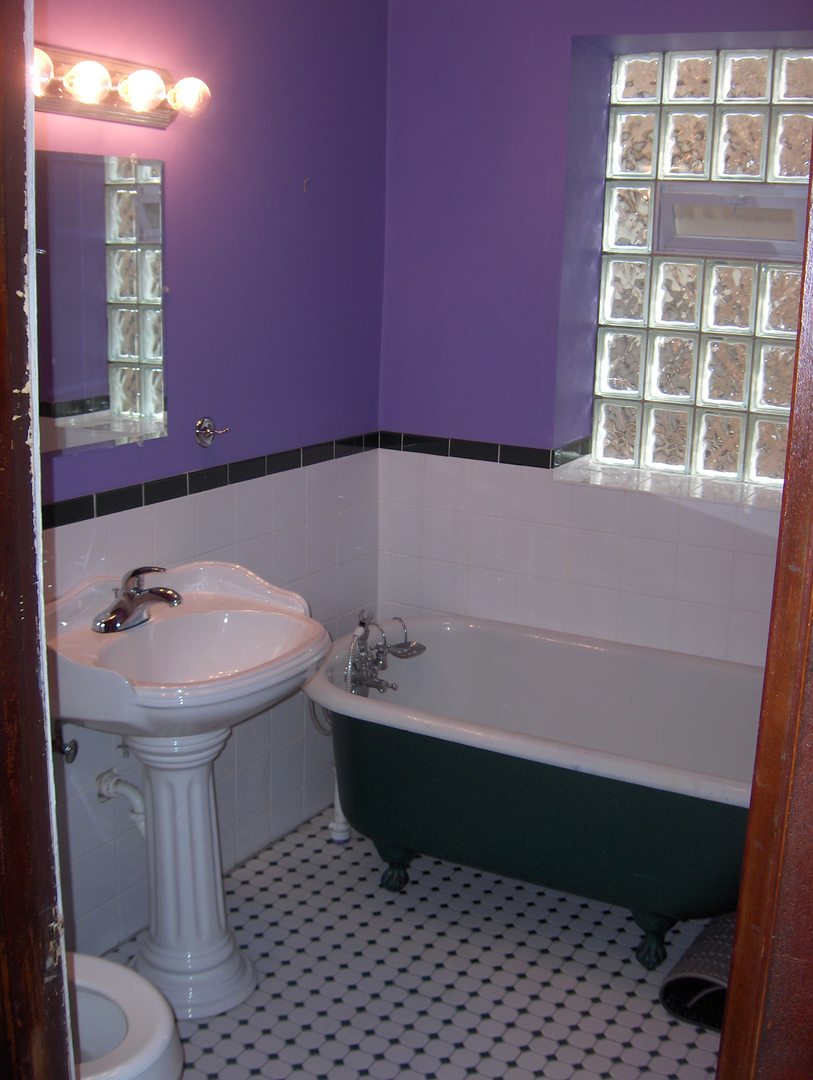 4039 North Long Avenue, Unit 1 Chicago, IL 60641 - Photo 10 of 20 a bathroom with a sink and a toilet