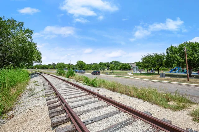a view of swimming pool with a yard