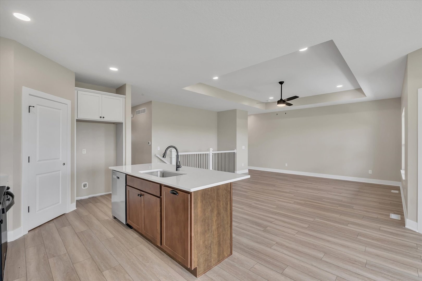455 Rhonda Road New Liberty, IA 52765 - Photo 22 of 54 a kitchen with a sink stainless steel appliances and cabinets
