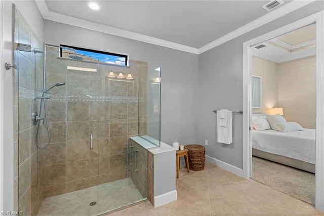 a bathroom with a shower and a sink