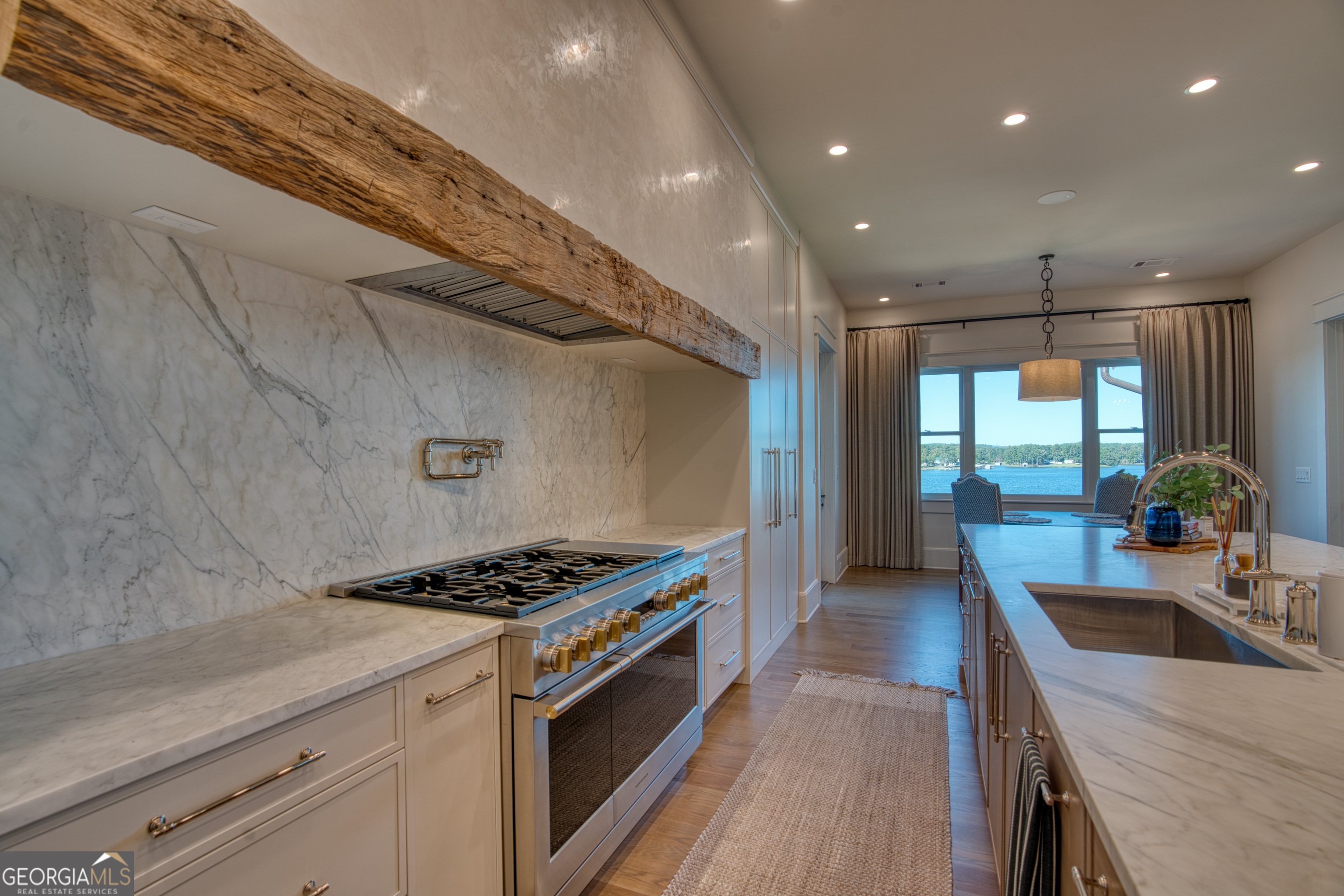 144 Co Road Leesburg, AL 35983 - Photo 21 of 109 a kitchen with stainless steel appliances granite countertop a sink a stove and a refrigerator