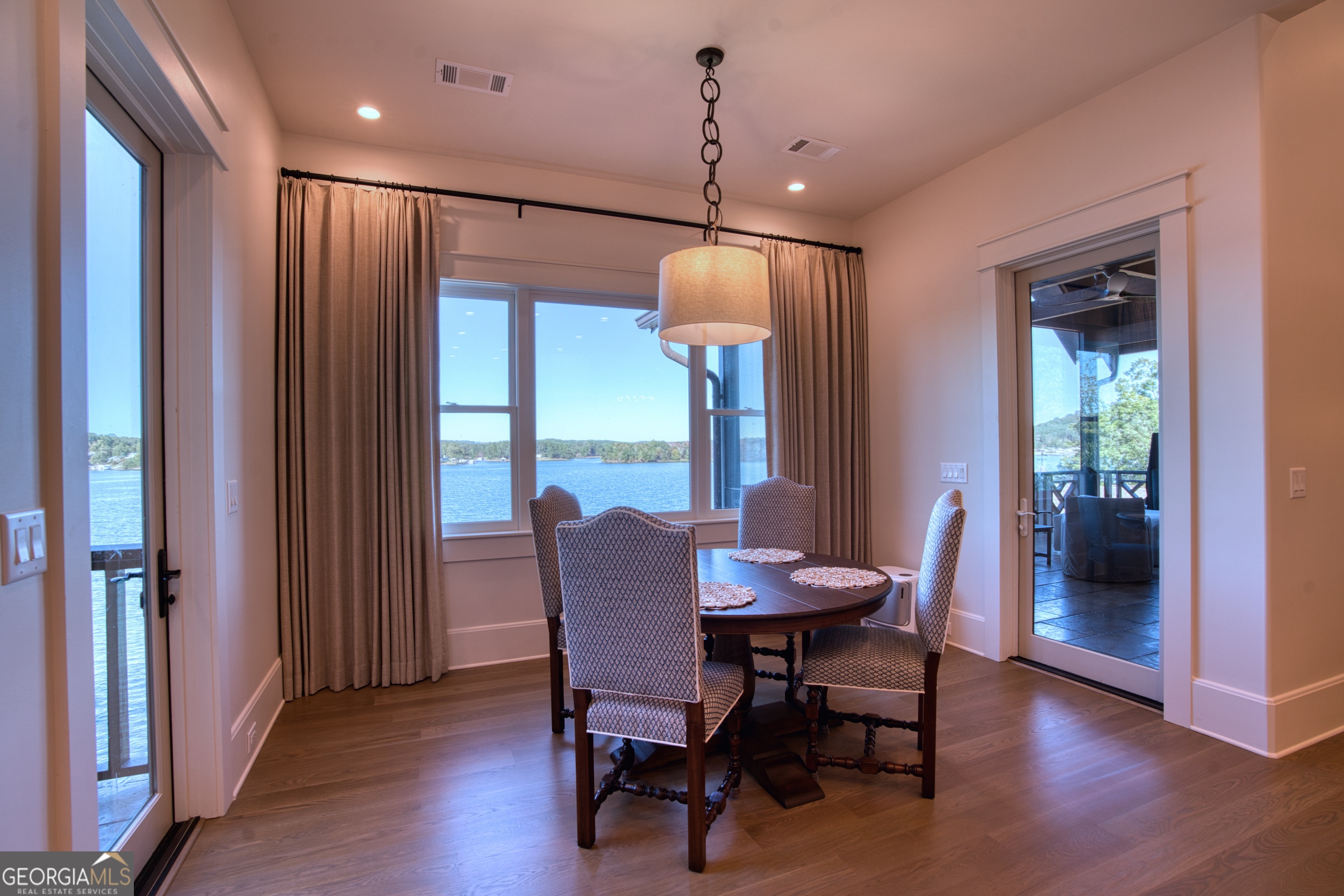 144 Co Road Leesburg, AL 35983 - Photo 29 of 109 a view of a dining room with furniture window and wooden floor