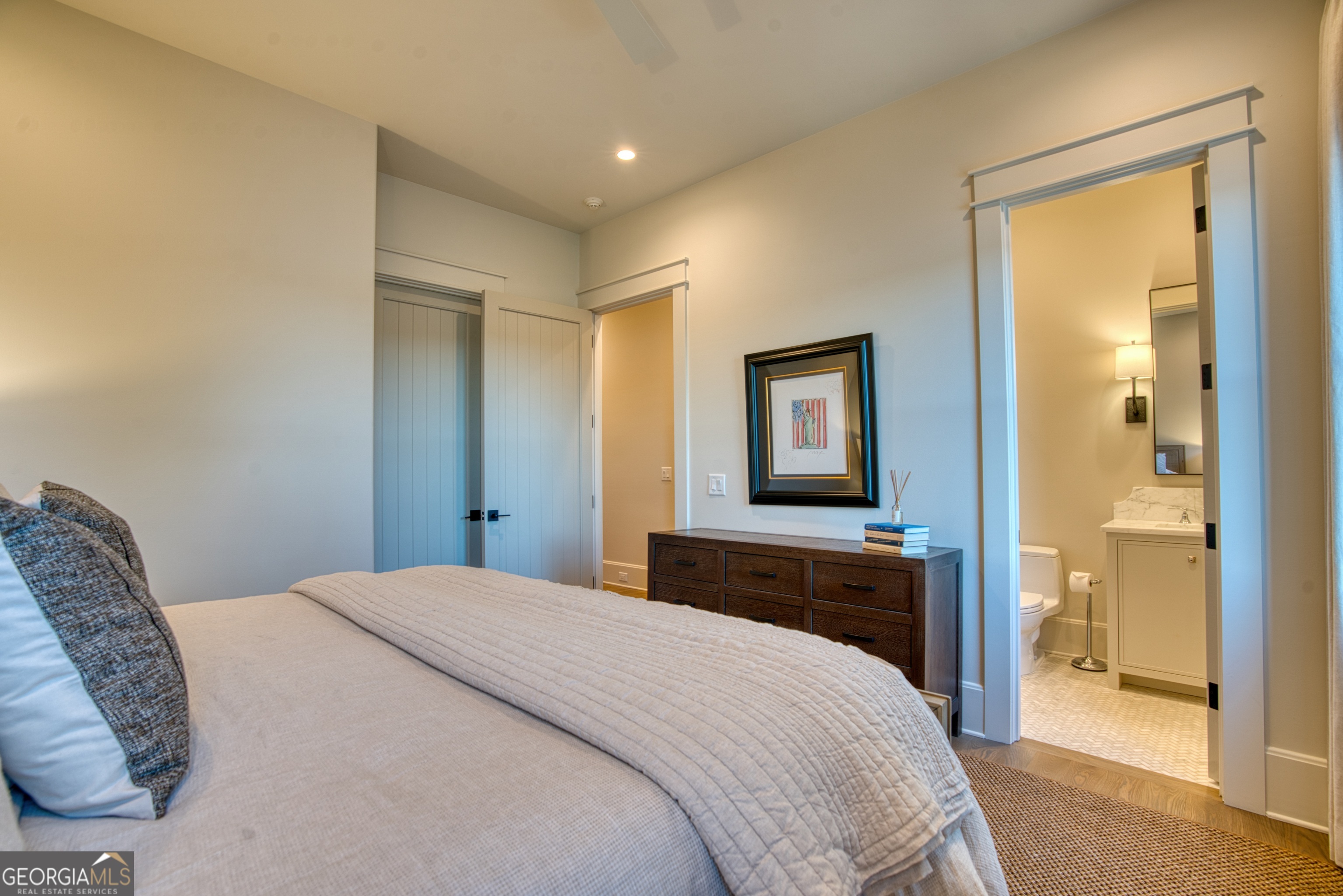 144 Co Road Leesburg, AL 35983 - Photo 46 of 109 a bedroom with a bed and a painting on the wall