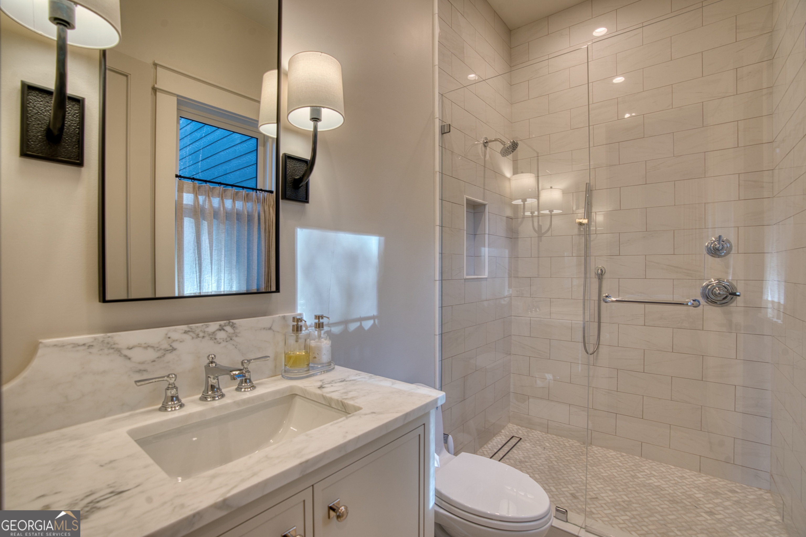 144 Co Road Leesburg, AL 35983 - Photo 50 of 109 a bathroom with a sink a toilet and shower