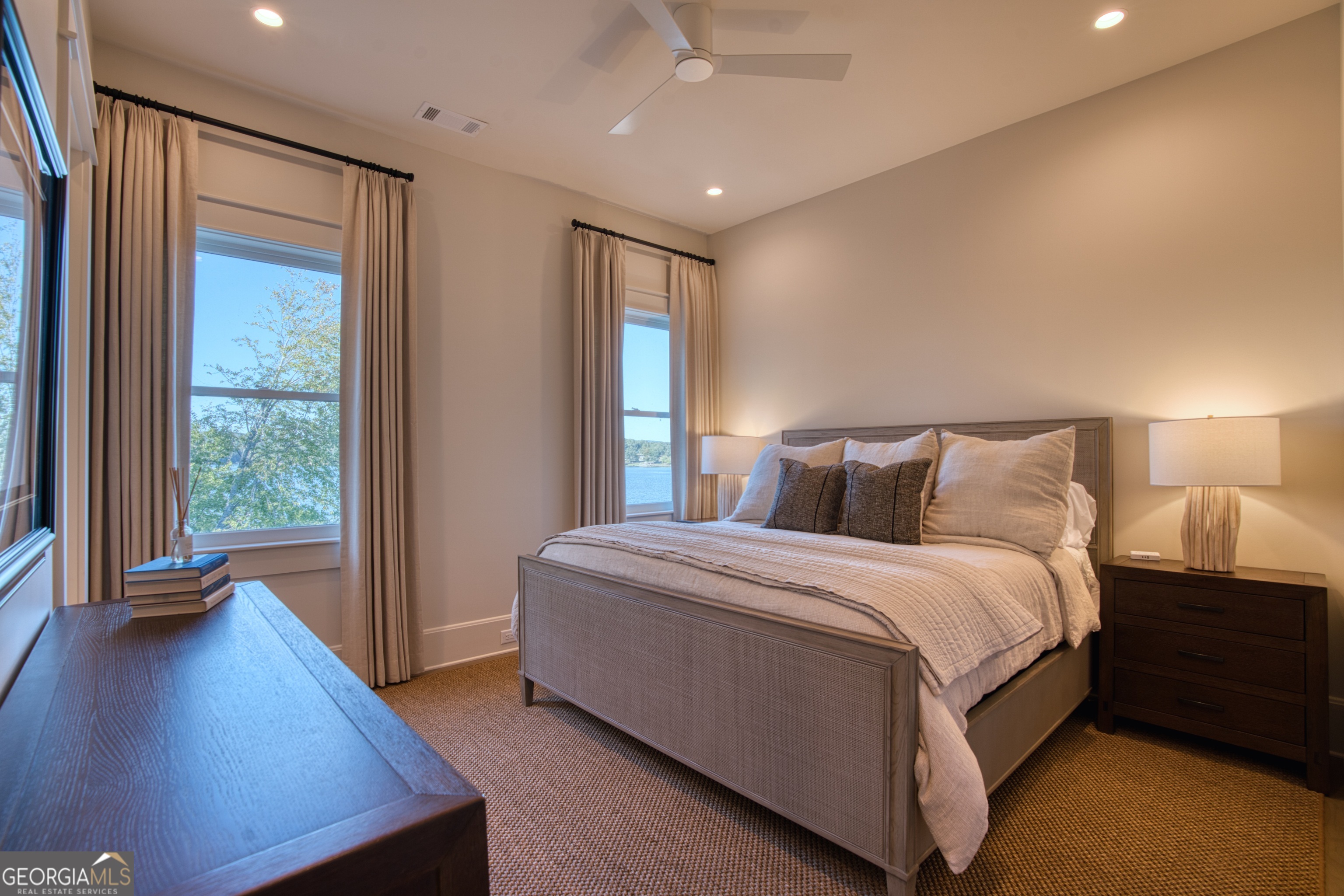 144 Co Road Leesburg, AL 35983 - Photo 51 of 109 a spacious bedroom with a bed and wooden floor