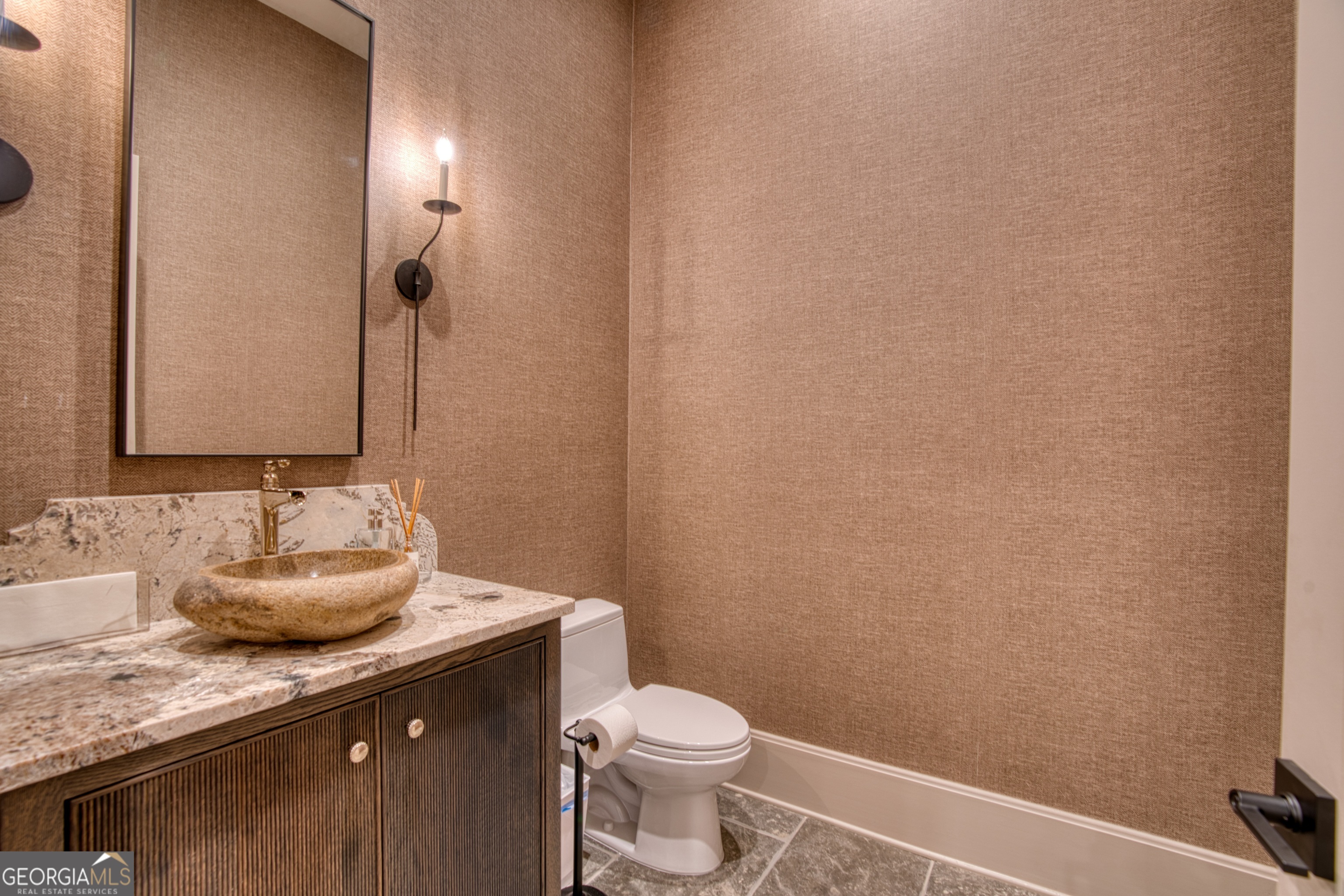144 Co Road Leesburg, AL 35983 - Photo 57 of 109 a bathroom with a granite countertop sink and a toilet