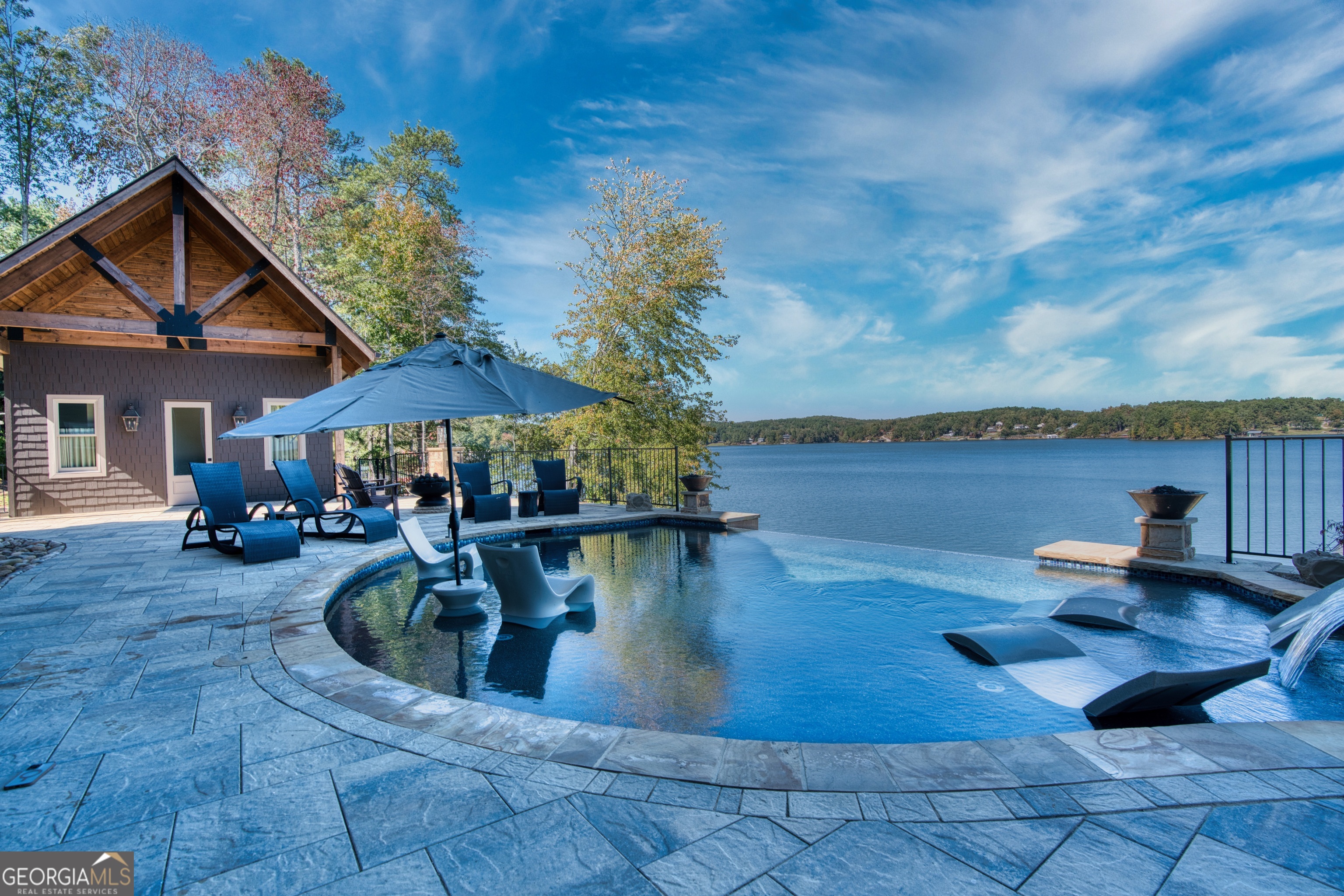 144 Co Road Leesburg, AL 35983 - Photo 82 of 109 a view of a swimming pool with lounge chairs in patio