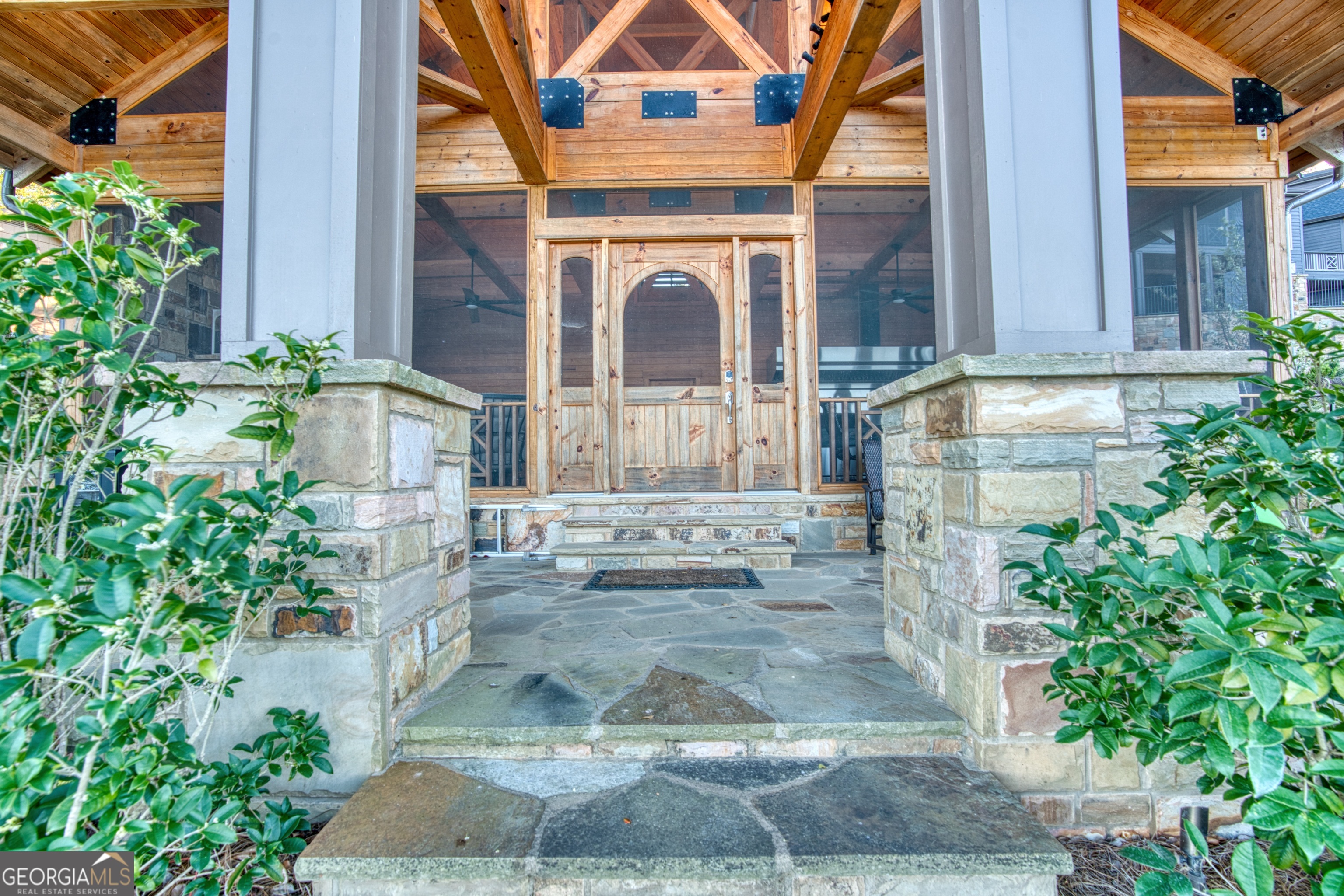 144 Co Road Leesburg, AL 35983 - Photo 89 of 109 a view of a brick house with plants and large tree