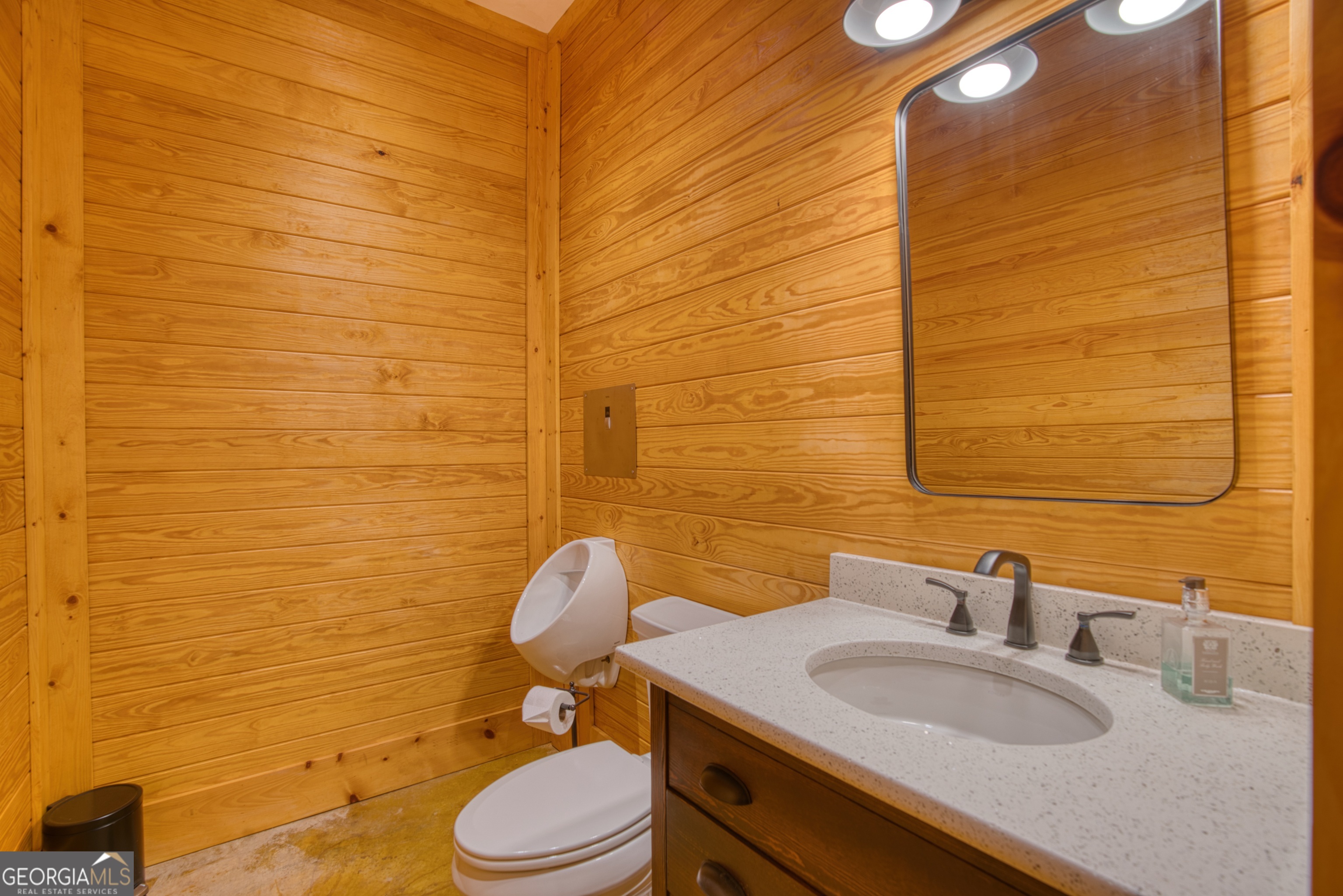 144 Co Road Leesburg, AL 35983 - Photo 97 of 109 a bathroom with a sink a toilet and a mirror