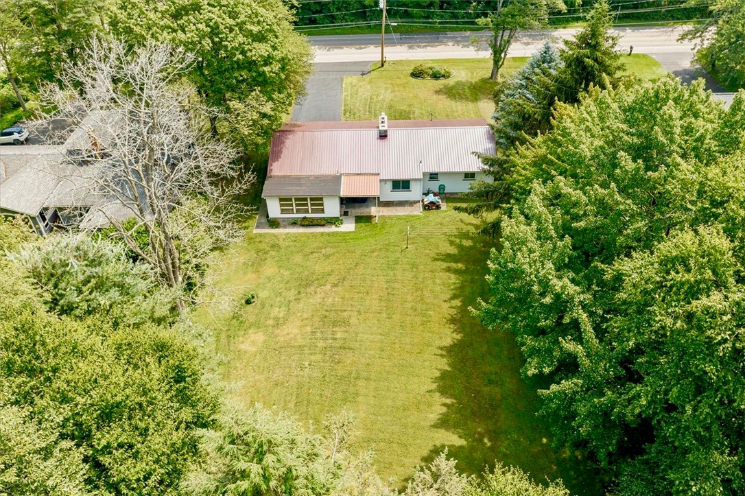 789 Gravel Road Webster, NY 14580 - Photo 4 of 39 Mature Trees Surrounding the Backyard creating you