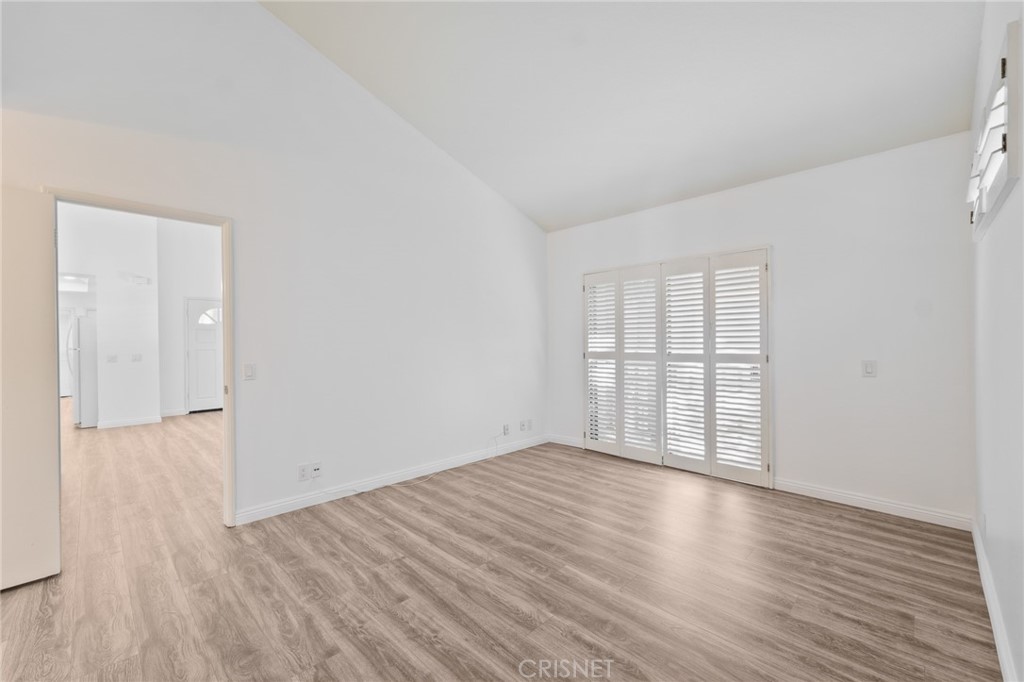 5712 Skyview Way, Unit A Agoura Hills, CA 91301 - Photo 17 of 31 wooden floor in an empty room with a window
