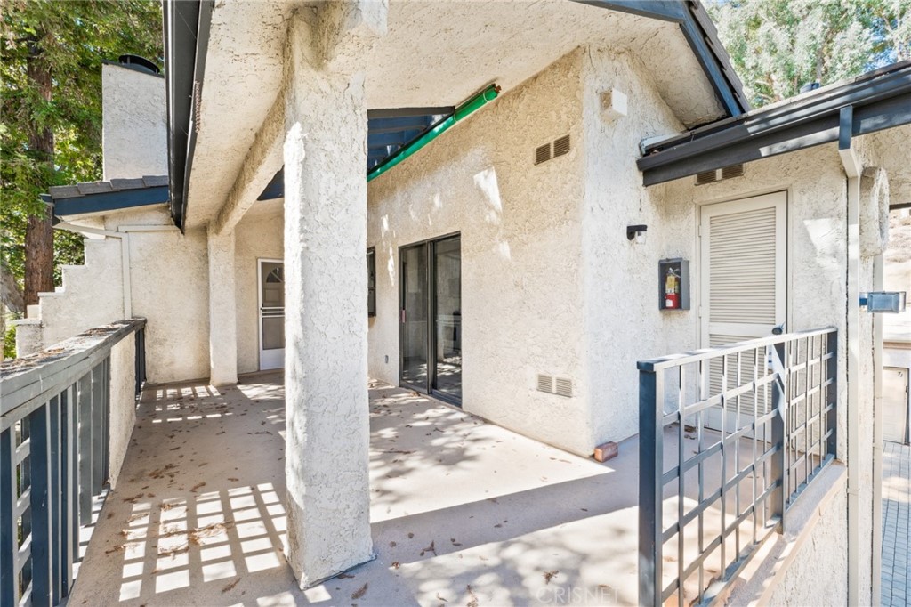 5712 Skyview Way, Unit A Agoura Hills, CA 91301 - Photo 2 of 31 a view of a house with a small yard