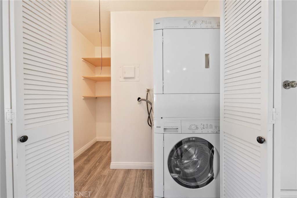 5712 Skyview Way, Unit A Agoura Hills, CA 91301 - Photo 23 of 31 a view of a hallway with washer and dryer