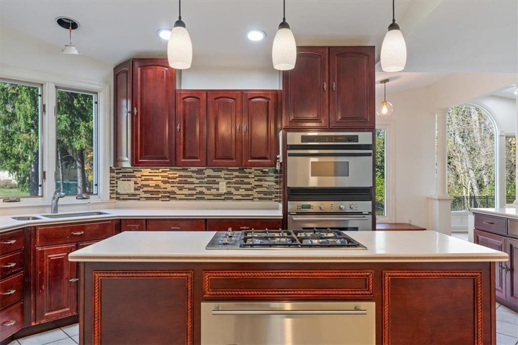 201 Dorseyville Road Pittsburgh, PA 15215 - Photo 13 of 40 a kitchen with a stove and a microwave
