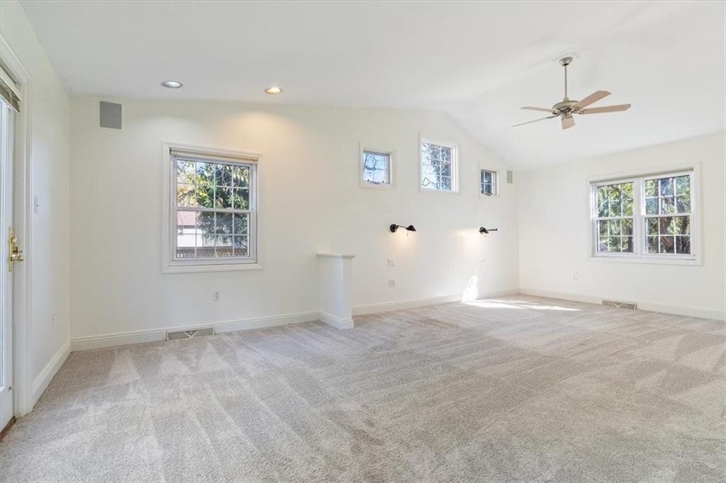 201 Dorseyville Road Pittsburgh, PA 15215 - Photo 16 of 40 an empty room with windows and ceiling fan