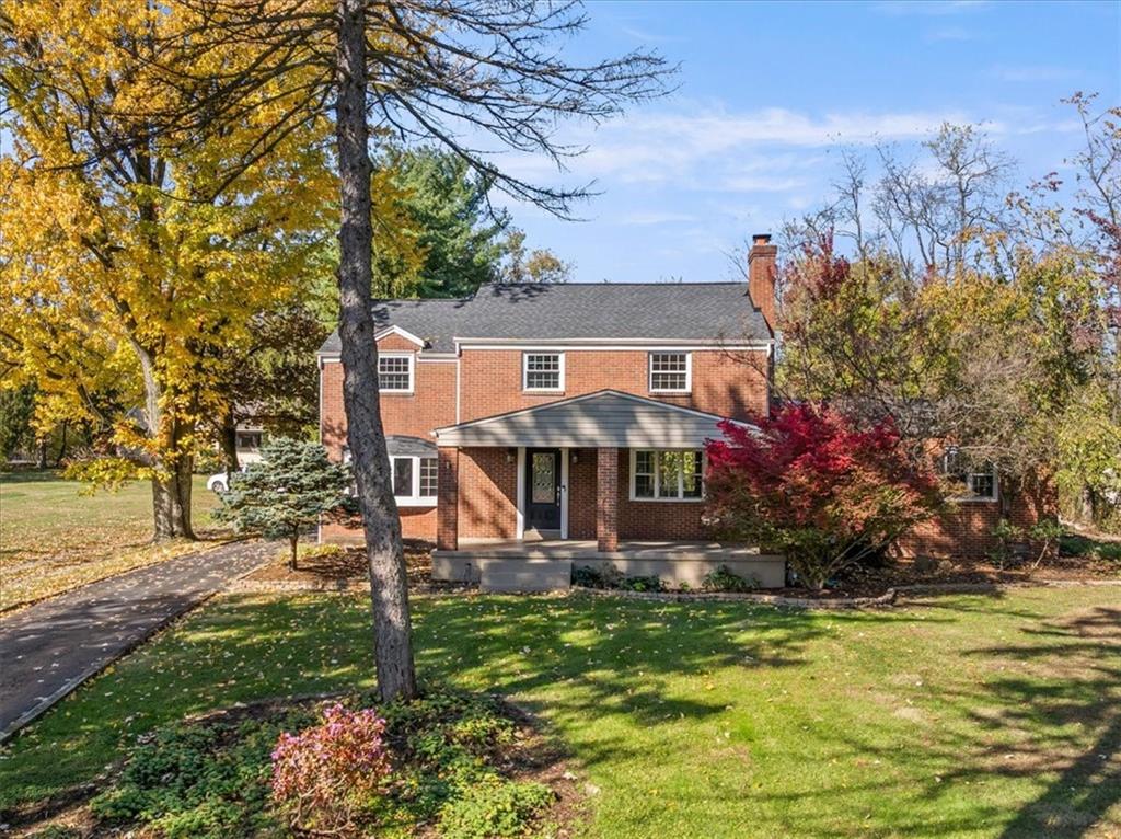 201 Dorseyville Road Pittsburgh, PA 15215 - Photo 2 of 40 a front view of a house with a yard