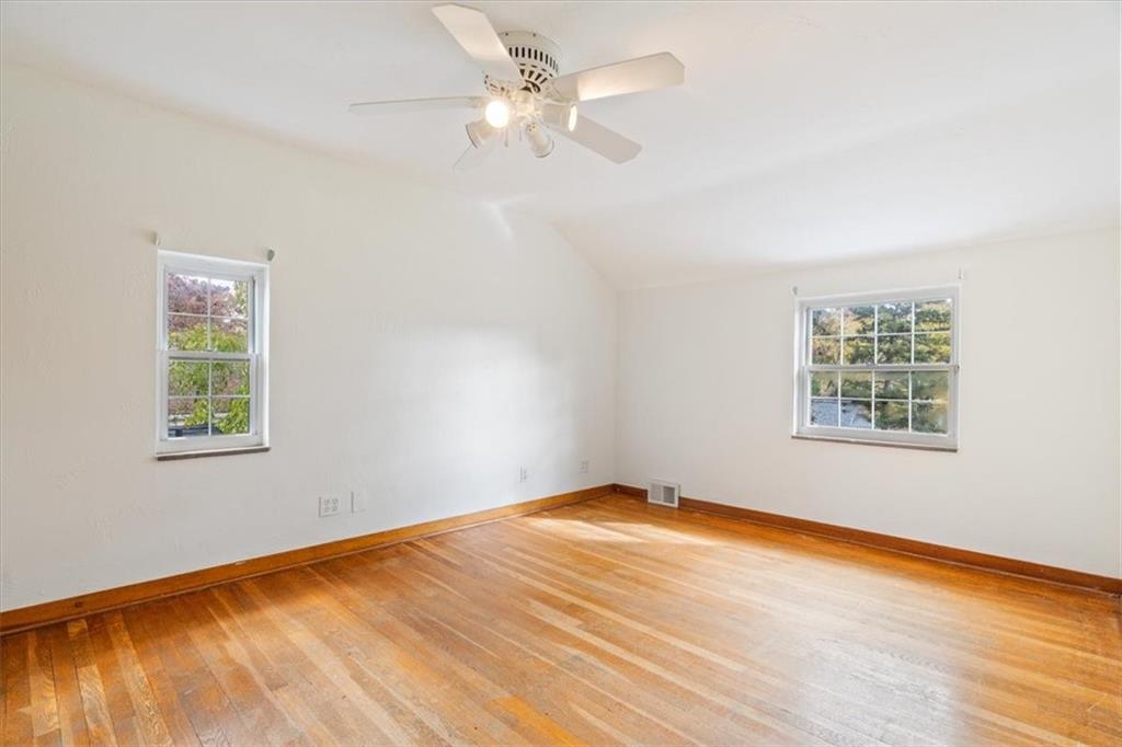 201 Dorseyville Road Pittsburgh, PA 15215 - Photo 26 of 40 wooden floor in an empty room with a window