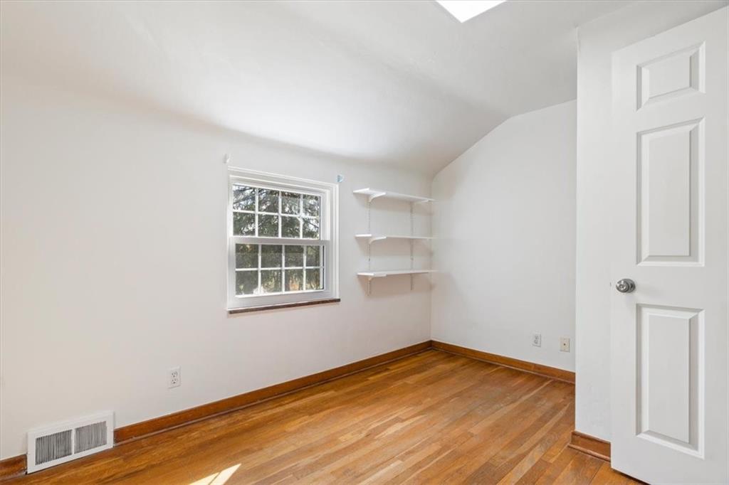 201 Dorseyville Road Pittsburgh, PA 15215 - Photo 27 of 40 a view of empty room with wooden floor and fan
