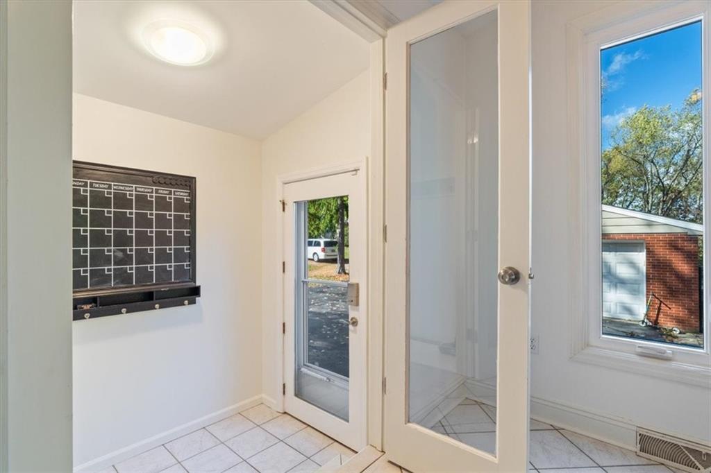 201 Dorseyville Road Pittsburgh, PA 15215 - Photo 31 of 40 a view of an entryway with wooden floor and door
