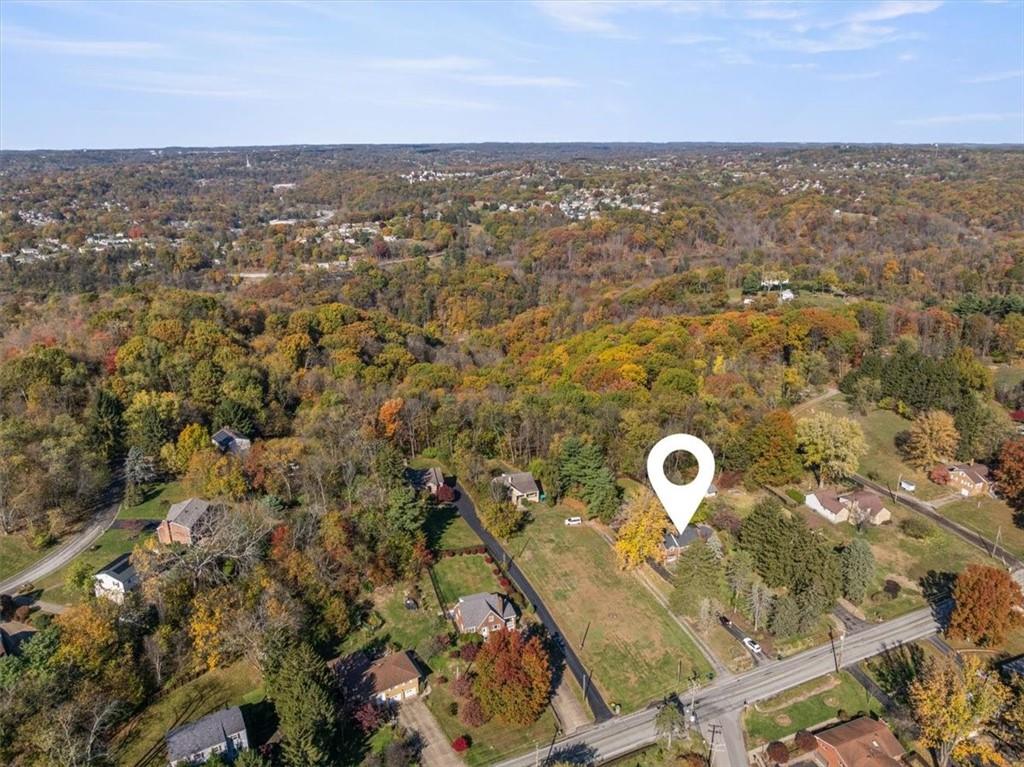 201 Dorseyville Road Pittsburgh, PA 15215 - Photo 40 of 40 an aerial view of a house with a swimming pool and mountain view