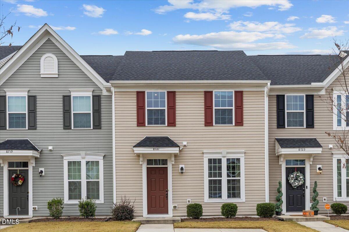 a front view of a building with street view