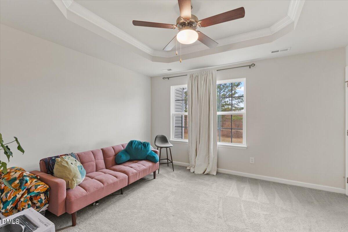 8721 Red Canyon Way Raleigh, NC 27616 - Photo 12 of 29 a living room with furniture and a window
