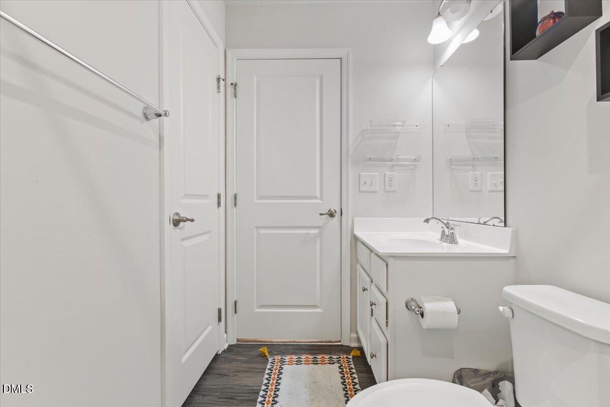 8721 Red Canyon Way Raleigh, NC 27616 - Photo 16 of 29 a bathroom with a sink toilet and shower