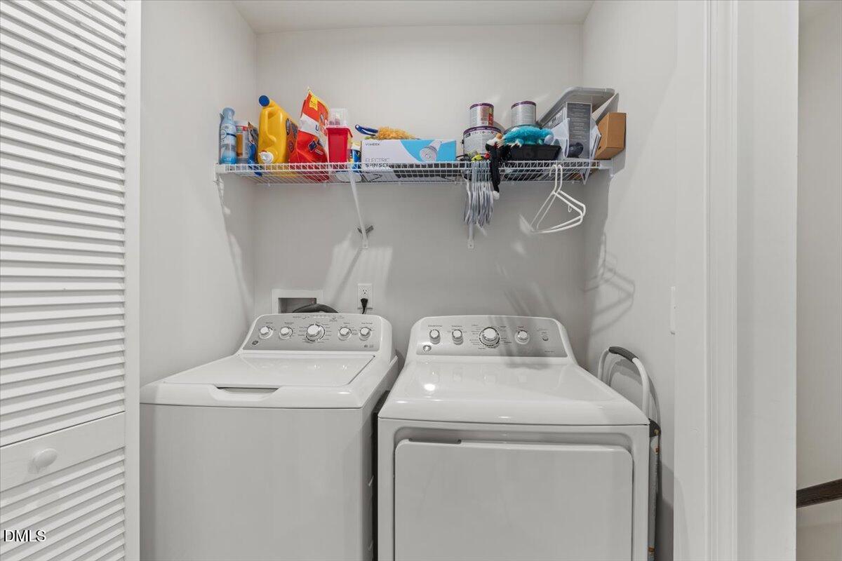 8721 Red Canyon Way Raleigh, NC 27616 - Photo 17 of 29 a utility room with dryer and washer