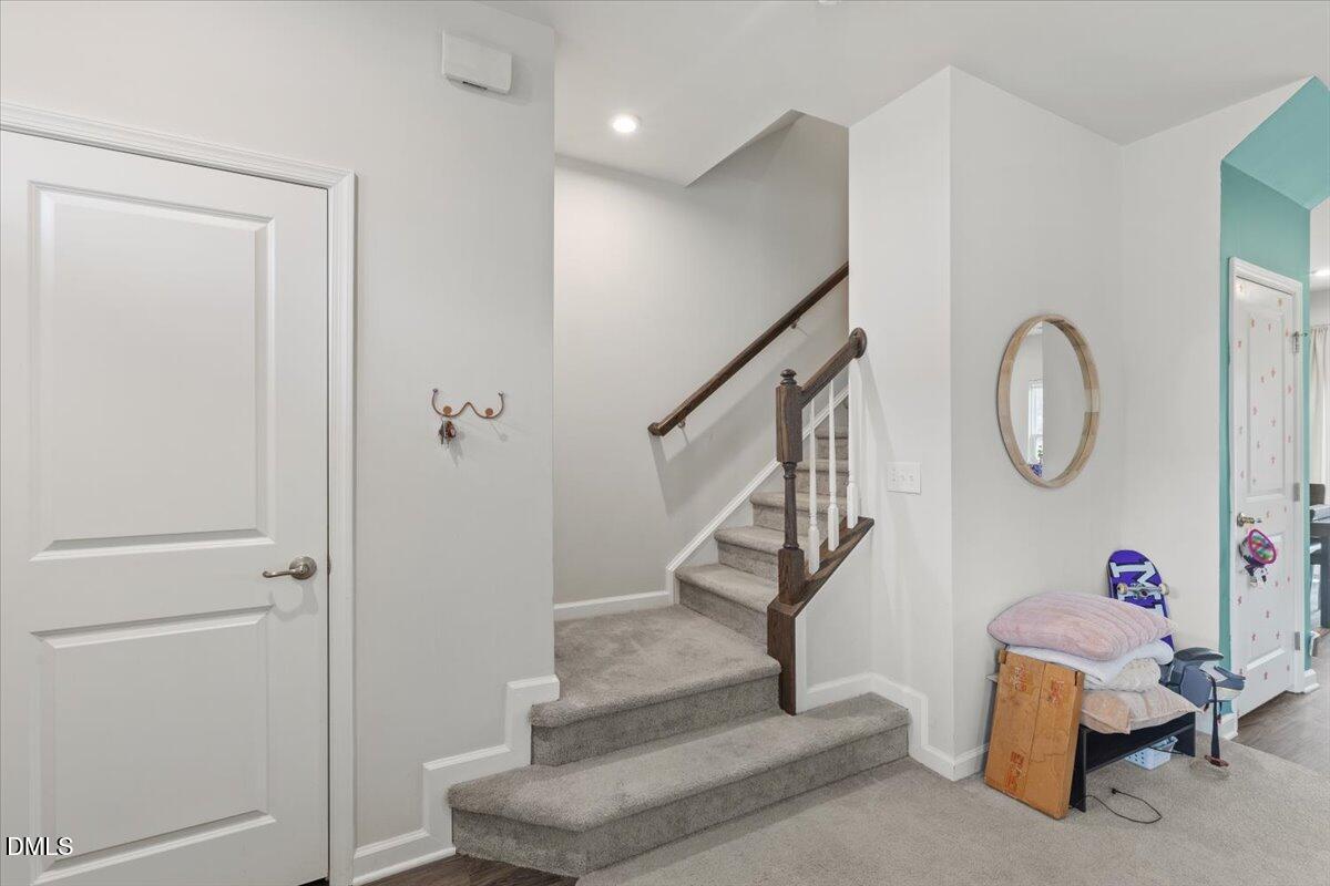 8721 Red Canyon Way Raleigh, NC 27616 - Photo 10 of 29 a view of entryway with wooden floor and workspace