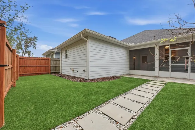 a view of a backyard with a garden