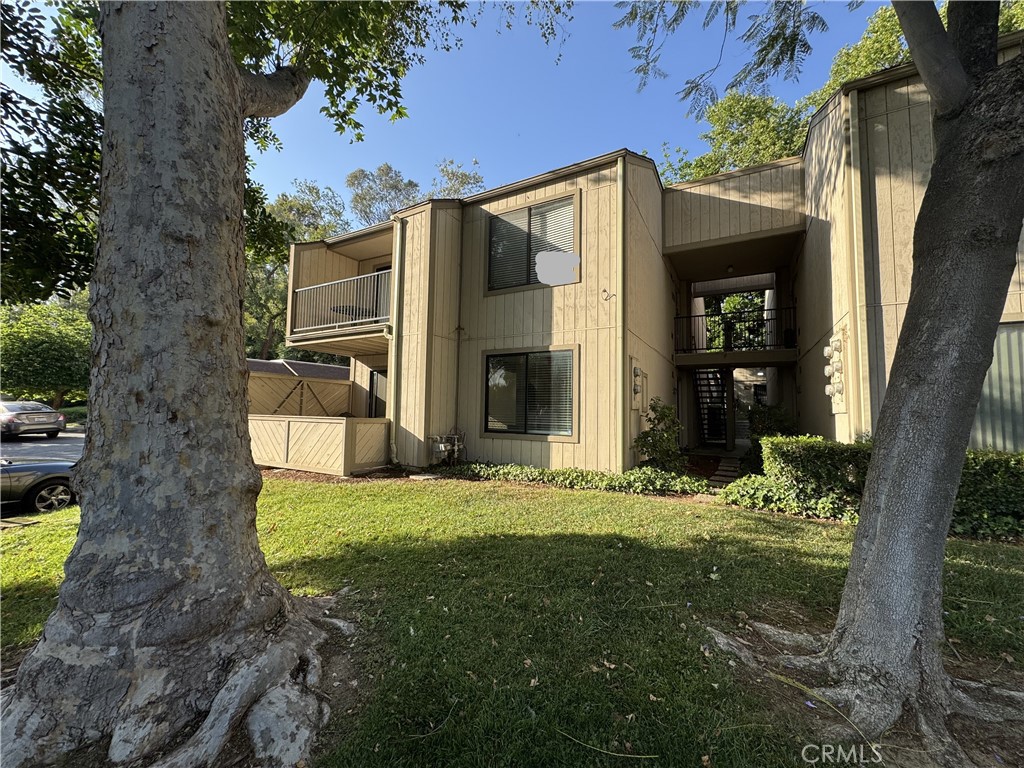 600 Central Avenue, Unit 302 Riverside, CA 92507 - Photo 1 of 27 a view of a house with backyard and garden