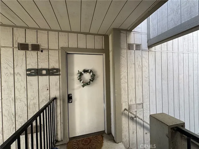 a view of a utility room with a shower