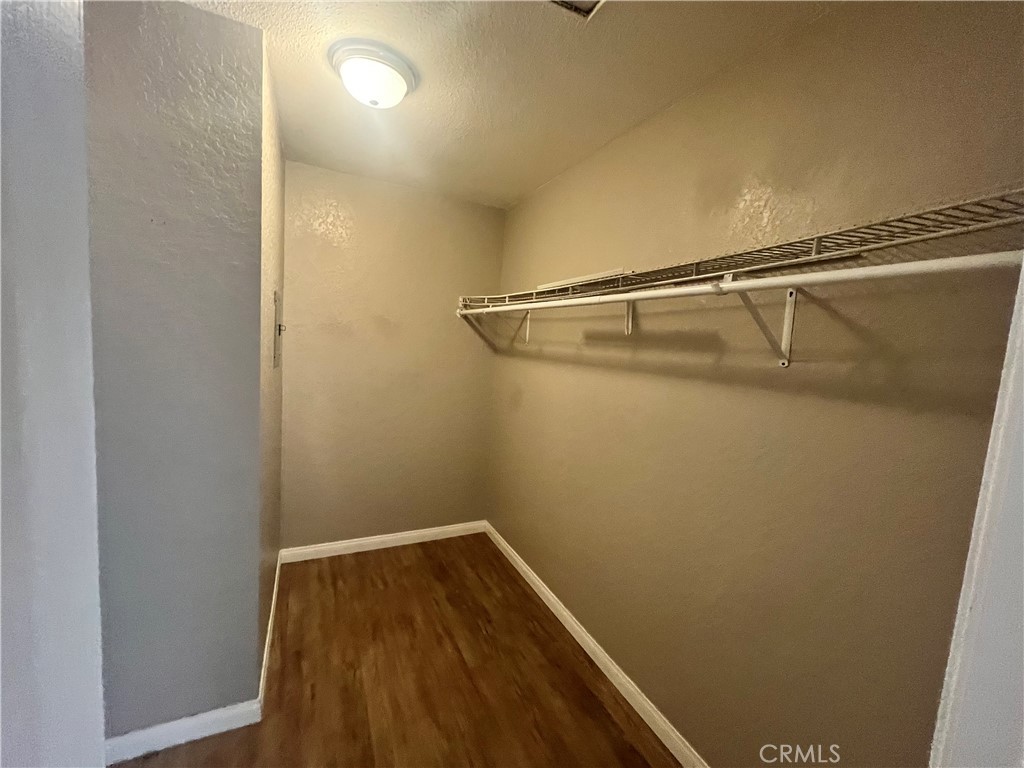 600 Central Avenue, Unit 302 Riverside, CA 92507 - Photo 22 of 27 a view of a room with racks on the wall