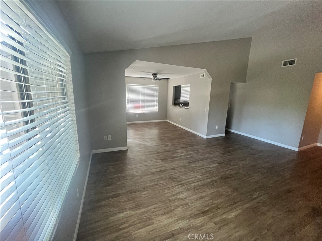 600 Central Avenue, Unit 302 Riverside, CA 92507 - Photo 4 of 27 a view of a hallway with wooden floor