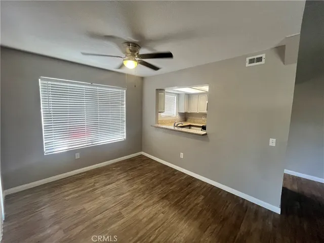a view of kitchen with wooden floor