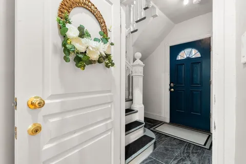 a view of a house with a white door