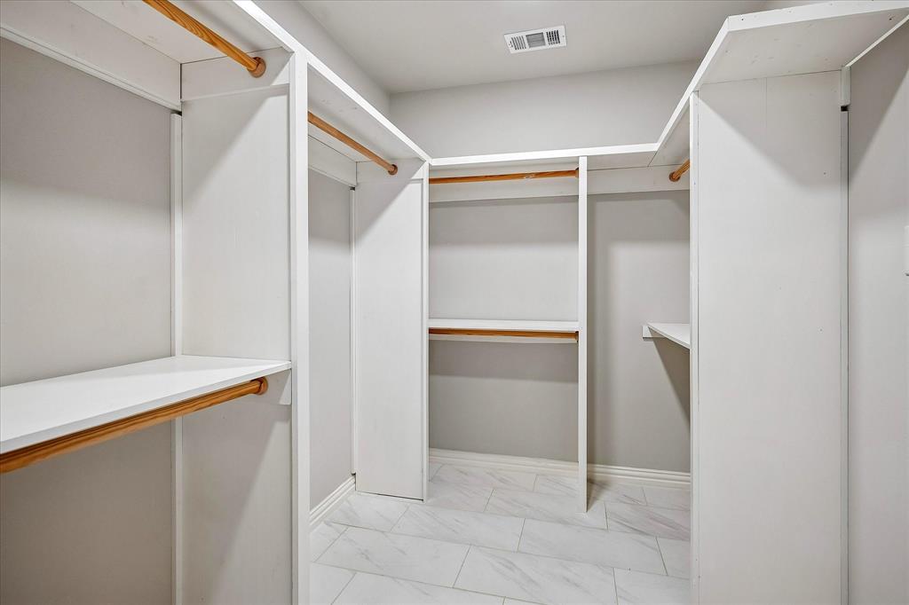 2001 Pebblebrook Trail Irving, TX 75060 - Photo 19 of 40 Large Walk-In Closet off the Primary Suite.