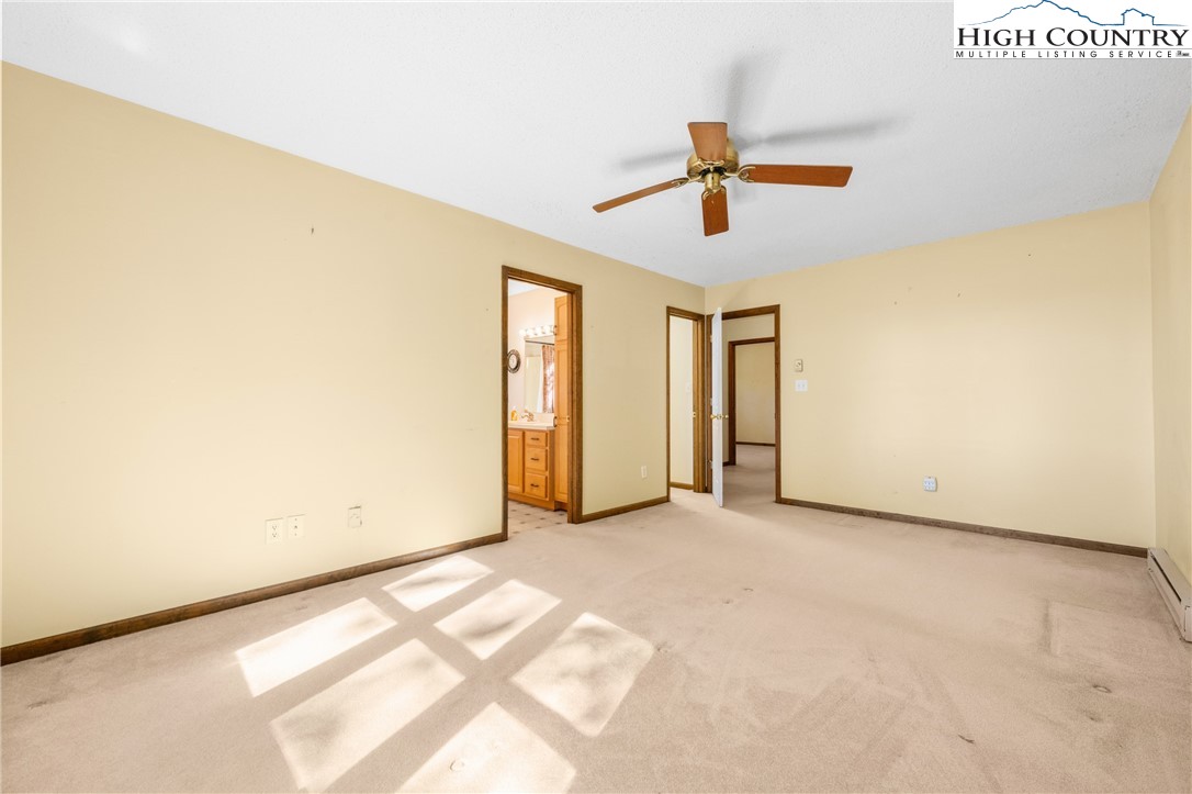 615 Sampson Road Boone, NC 28607 - Photo 16 of 36 a view of empty room with ceiling fan