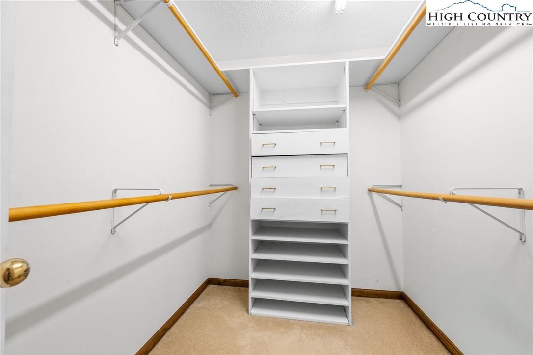 615 Sampson Road Boone, NC 28607 - Photo 26 of 36 a view of walk in closet with empty racks