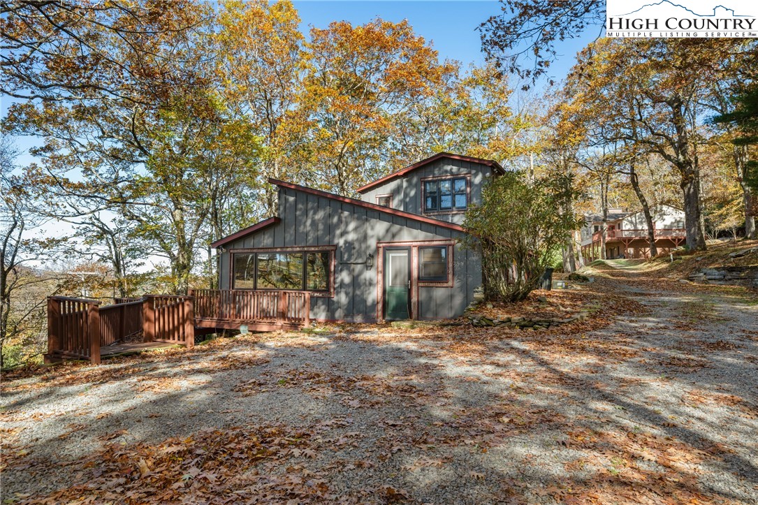 615 Sampson Road Boone, NC 28607 - Photo 3 of 36 a view of a house with a yard