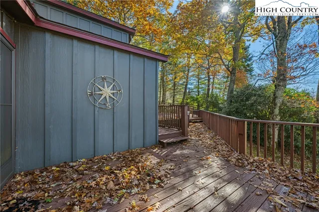 a view of a pathway of a wooden house