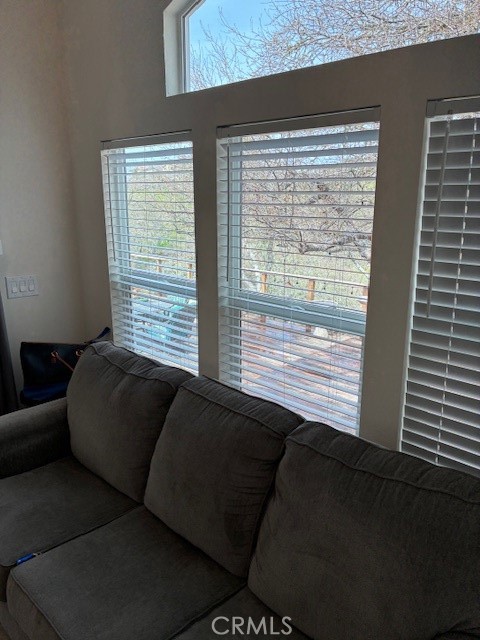 2377 Comanche Way Paso Robles, CA 93446 - Photo 9 of 33 a living room with furniture and a large window