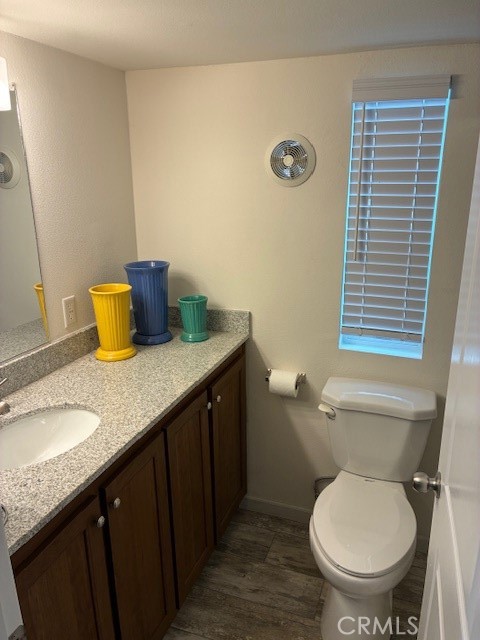 2377 Comanche Way Paso Robles, CA 93446 - Photo 10 of 33 a bathroom with a granite countertop toilet sink and mirror