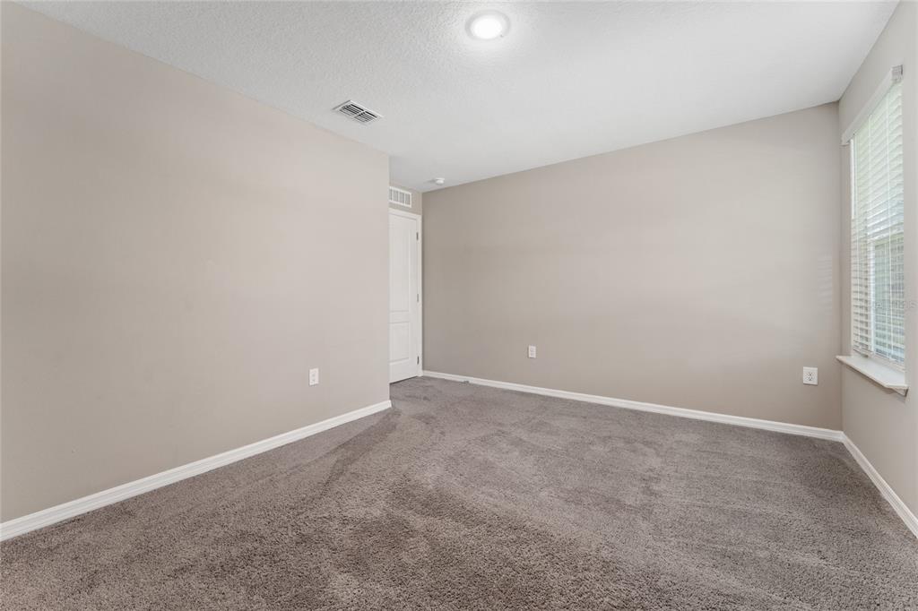 4331 Wayne Road Fruitland Park, FL 34731 - Photo 30 of 46 a view of an empty room and a window