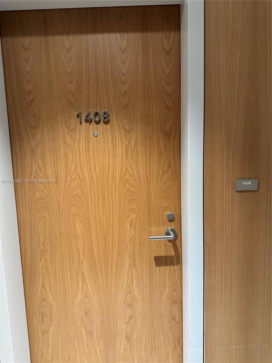 500 Alton Road, Unit 1408 Miami Beach, FL 33139 - Photo 19 of 21 a bathroom with a shower