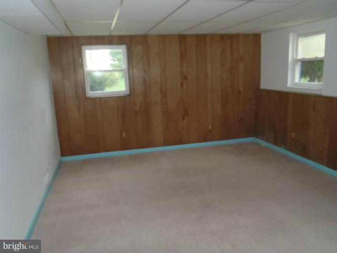 1318 Gatefield Road Catonsville, MD 21228 - Photo 1 of 14 an empty room with windows